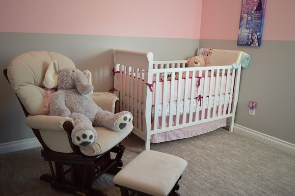 Baby crib in a room